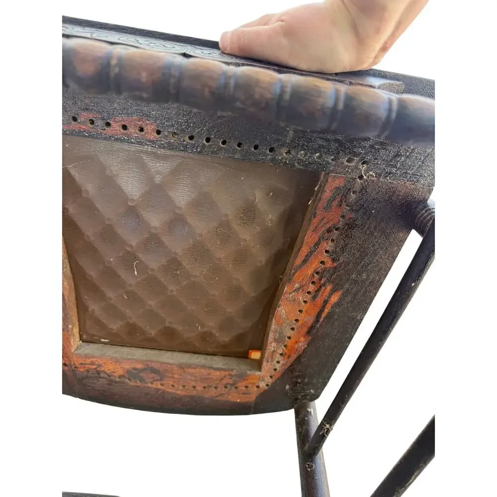 Antique Spindle Rocking Chair With Carvings and Cutout accent